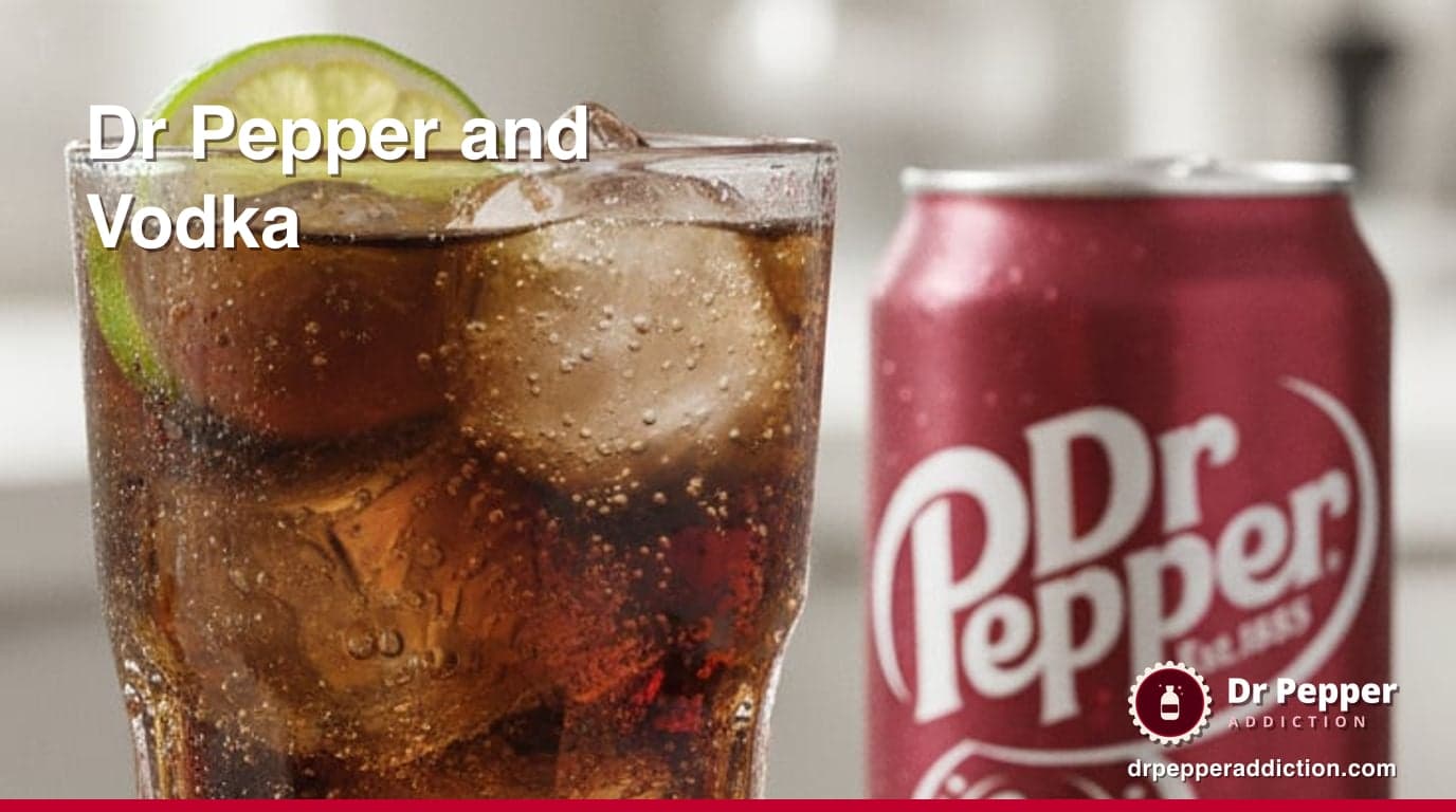 A tall highball glass of dark Dr Pepper and vodka over ice with a lime wheel and a cherry, beads of condensation on the glass